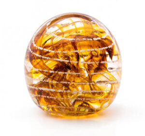 Gold glass dome paperweight